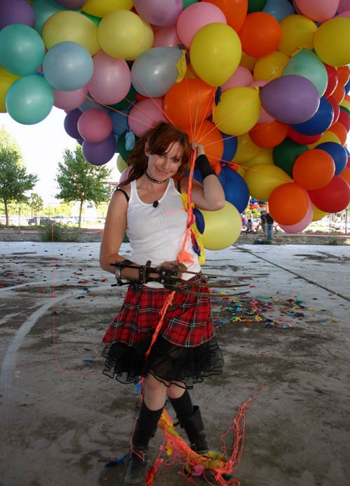 Kari Byron holding balloons